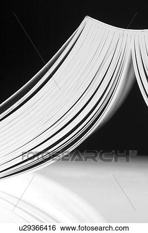 Stock Photograph - books, heap, sheets, paper sheets, note books, text books. Fotosearch