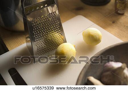 Stock Photo - Bowl, Close-Up, Counter, Cutting Board, Garlic. Fotosearch