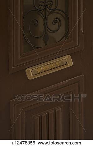 Stock Photograph - Brass, Capital Letter, Close-Up, Design, Door. Fotosearch