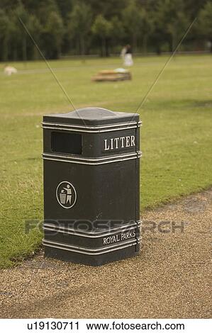 Capital Letter, Day, Focus On Foreground, Garbage Bin, Grass View Large Photo Image Stock Image - Capital Letter, Day, Focus On Foreground, Garbage Bin, Grass. Fotosearch
