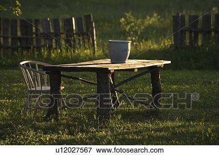 Stock Photo - Chair, Day, Fence, Greenery. Fotosearch