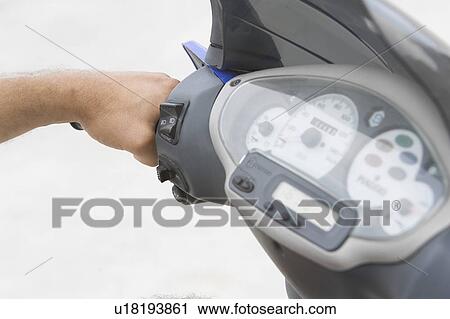 Stock Image - Close-Up, Dashboard, Day, Human Hand. Fotosearch