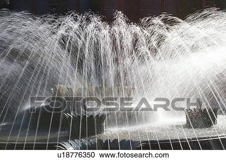 Stock Image - Close-Up, Flow, Force, Fountain, Glow. Fotosearch
