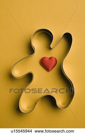 Close-Up, Full Frame, Gingerbread Man, Heart Shape, Indoors View Large Photo Image Picture - Close-Up, Full Frame, Gingerbread Man, Heart Shape, Indoors. Fotosearch