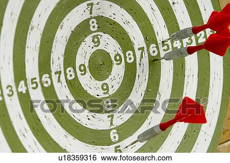 Stock Photograph - dartboard, board, circular, numbered, plaything, game. Fotosearch