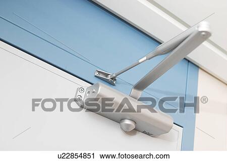 Stock Image - door, hydraulic, hydraulic arm, arm, device, hydraulic device. Fotosearch