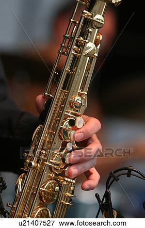 horn, hands, saxophone, music, device, harmonious View Large Photo Image Stock Photo - horn, hands, saxophone, music, device, harmonious. Fotosearch
