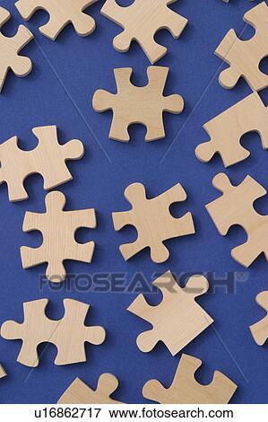 Stock Photo - teaser, scattered, blue, mind game, puzzle, piece. Fotosearch