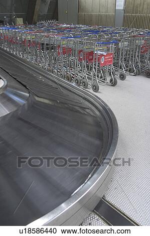 Stock Image - trolley, commute, motion, travel, airport. Fotosearch