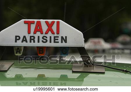 Stock Image - urban, city, traffic, automobiles, car, taxicab. Fotosearch