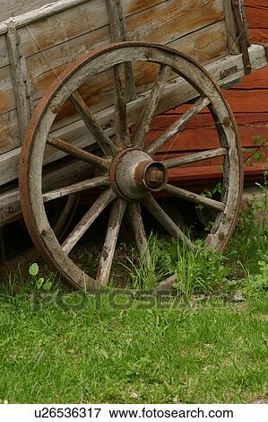 Stock Photo - wagon, spokes, antique, weathered, worn, equipment. Fotosearch