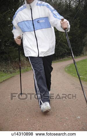 Stock Photo - Male Nordic walker. Fotosearch