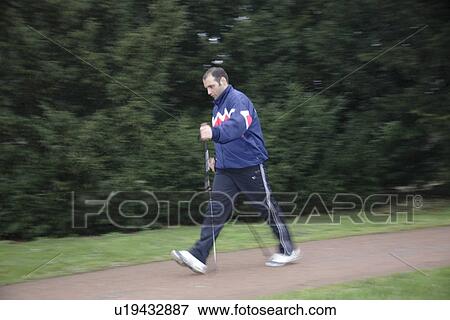 Male Nordic walker View Large Photo Image Stock Photo - Male Nordic walker. Fotosearch