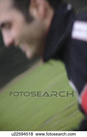 Young man jogging, side view, motion blur View Large Photo Image Stock Photo - Young man jogging, side view, motion blur. Fotosearch