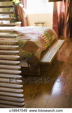 Stock Photo - Bright Bedroom with Quilt. Fotosearch