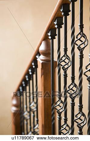 Detail of descending staircase banister View Large Photo Image Stock Photo - Detail of descending staircase banister. Fotosearch