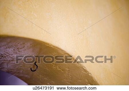 Detail of hook under archway. View Large Photo Image Stock Image - Detail of hook under archway.. Fotosearch