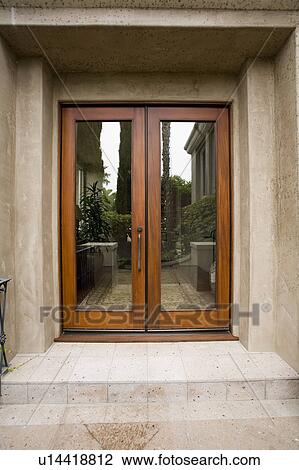 Detail of recessed glass front doors up steps. View Large Photo Image Stock Image - Detail of recessed glass front doors up steps.. Fotosearch