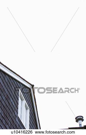 Stock Photograph - Exterior Detail of Shingled House. Fotosearch