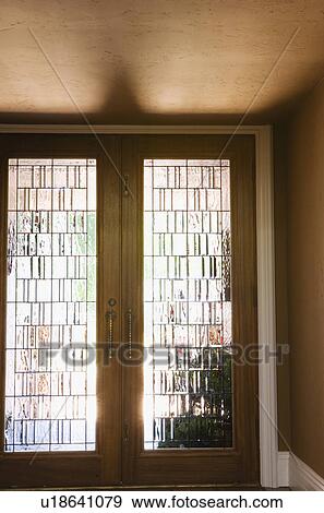 Stock Photo - Front Door Glass Detail. Fotosearch