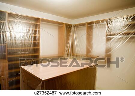 New Closet with Plastic Wrap View Large Photo Image Stock Photo - New Closet with Plastic Wrap. Fotosearch