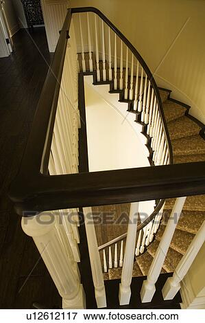 Traditional Stairway, Bannister, and Foyer, photographed From Above View Large Photo Image Stock Photo - Traditional Stairway, Bannister, and Foyer, photographed From Above. Fotosearch