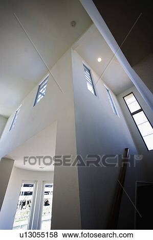 Vaulted Ceiling and White Walls in Contemporary Home View Large Photo Image Stock Photo - Vaulted Ceiling and White Walls in Contemporary Home. Fotosearch