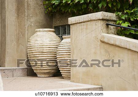 Vignette of two large clay pots. View Large Photo Image Stock Image - Vignette of two large clay pots.. Fotosearch