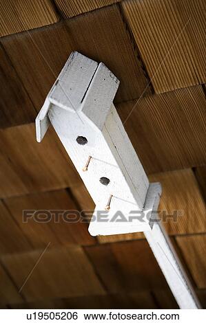 White Birdhouse in Front of Wood Shingle Wall View Large Photo Image Stock Photograph - White Birdhouse in Front of Wood Shingle Wall. Fotosearch