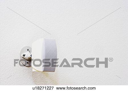 Stock Photo - White Surround Sound Speaker Mounted on White Wall. Fotosearch