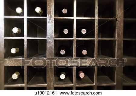 Stock Image - Wine Cellar Shelving for Wine Bottles. Fotosearch