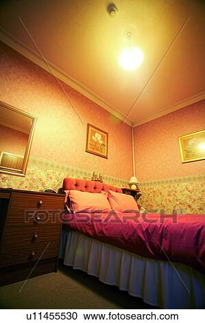 Bed in motel room View Large Photo Image Stock Image - Bed in motel room. Fotosearch