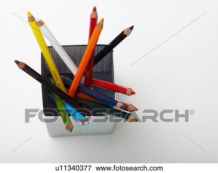 Stock Photo - Colour pencils in pot, close up. Fotosearch
