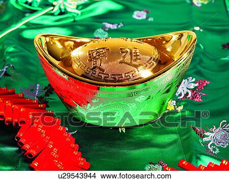 Gold ingot, Chinese New Year Ornament, Close up View Large Photo Image Picture - Gold ingot, Chinese New Year Ornament, Close up. Fotosearch
