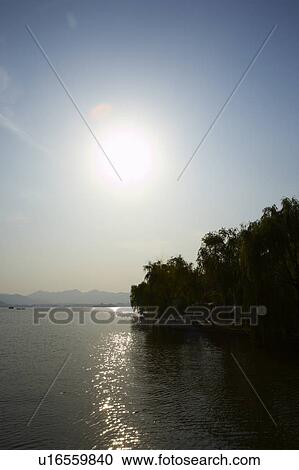 West Lake in Hangzhou, Zhejiang Province, People Republic of China View Large Photo Image Stock Image - West Lake in Hangzhou, Zhejiang Province, People Republic of China. Fotosearch