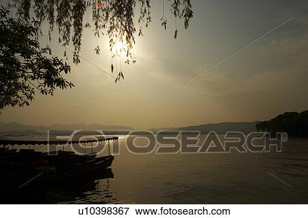 West Lake in Hangzhou, Zhejiang Province, People Republic of China View Large Photo Image Stock Photo - West Lake in Hangzhou, Zhejiang Province, People Republic of China. Fotosearch