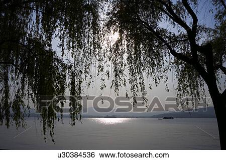West Lake in Hangzhou, Zhejiang Province, People Republic of China View Large Photo Image Stock Photograph - West Lake in Hangzhou, Zhejiang Province, People Republic of China. Fotosearch