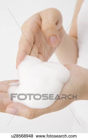 Bubbles on the hand View Large Photo Image Stock Photo - Bubbles on the hand. Fotosearch