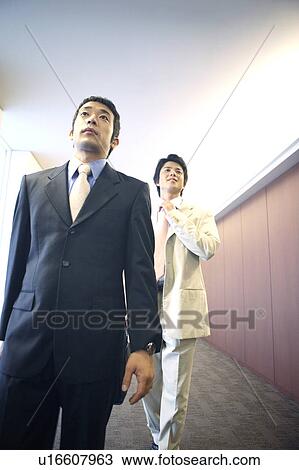 Businessmen moving View Large Photo Image Stock Image - Businessmen moving. Fotosearch