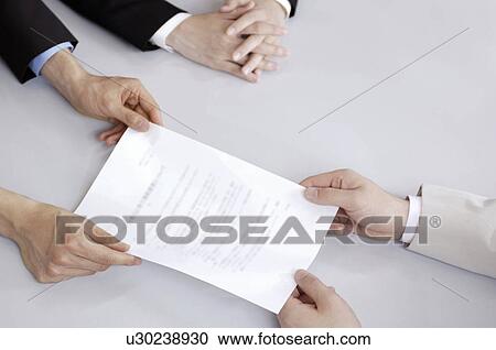 Stock Image - Exchange of the document. Fotosearch