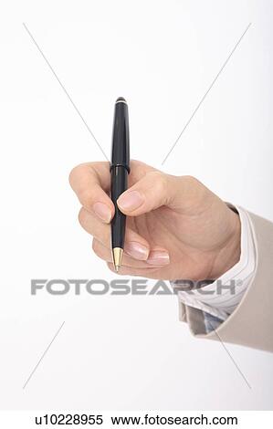 Stock Photography - Hand of woman holding a pen. Fotosearch
