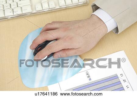 Stock Photograph - Hand with a mouse. Fotosearch