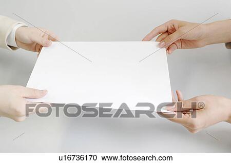 Hands delivering a contract. View Large Photo Image Stock Image - Hands delivering a contract.. Fotosearch
