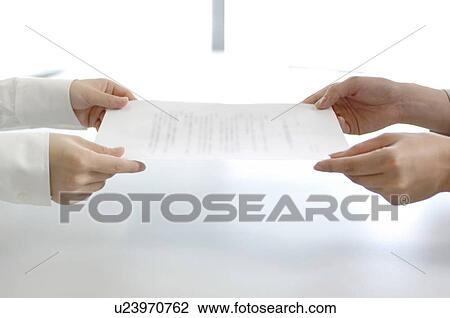 Hands delivering a contract View Large Photo Image Stock Image - Hands delivering a contract. Fotosearch