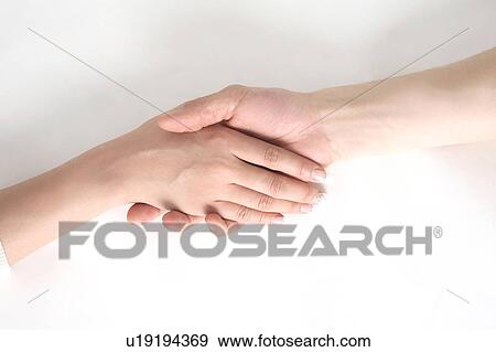 Stock Photo - Shake hands. Fotosearch