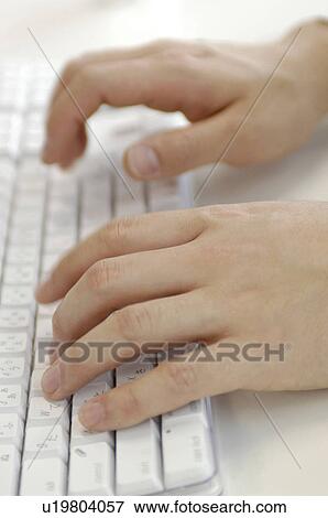 Stock Photo - Typing on keyboard. Fotosearch