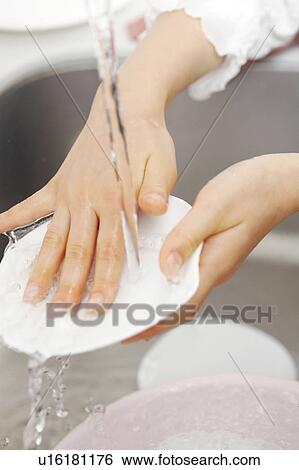 Washing dishes View Large Photo Image Stock Photograph - Washing dishes. Fotosearch