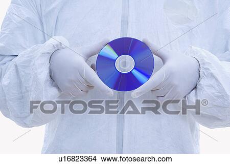 biohazard suit and latex gloves holding compact disc View Large Photo Image Picture - biohazard suit and latex gloves holding compact disc. Fotosearch