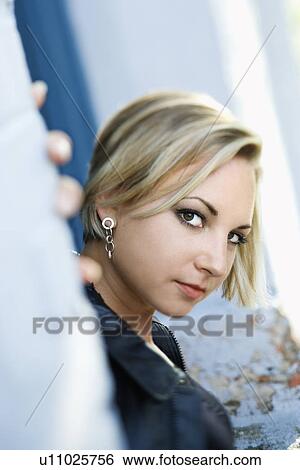 Stock Photograph - blonde woman looking at viewer.. Fotosearch