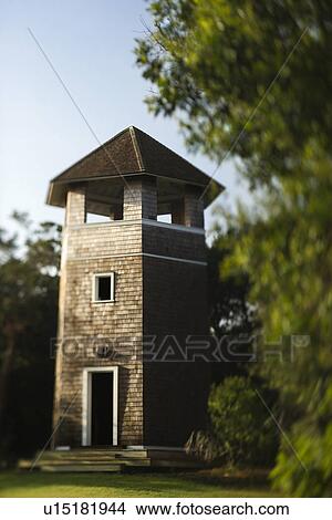 Picture - Brick tower standing in park. Fotosearch
